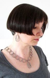 overlapping earrings and overlapping necklace