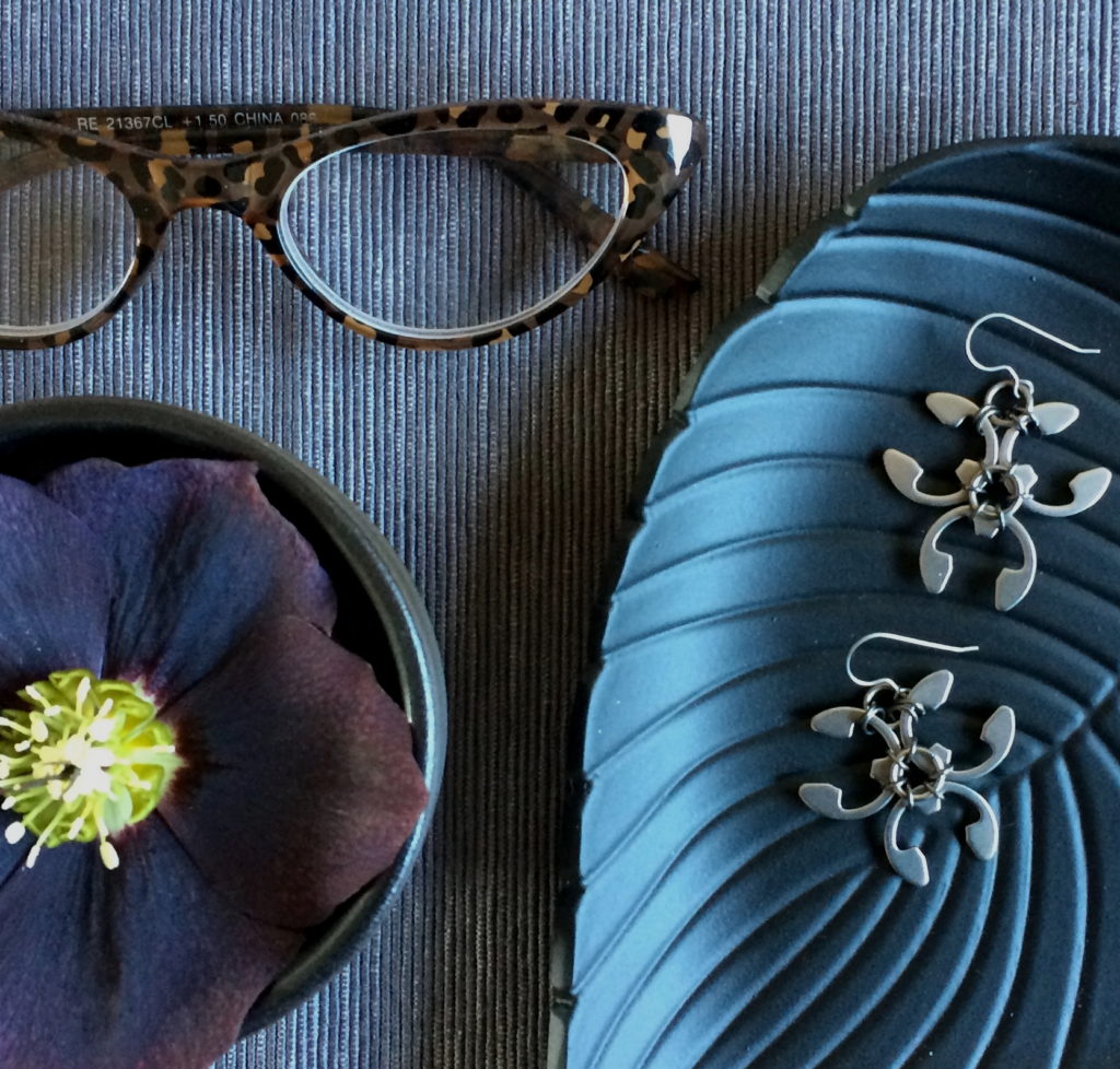 jewelry vignette with hellebore and trellis earrings