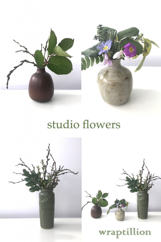 A compiled image featuring photographs of three small everyday winter into spring flower arrangements with bare branches, evergreen leaves, and early spring flowers in handmade ceramic vases. Text on image reads: studio flowers. wraptillion.