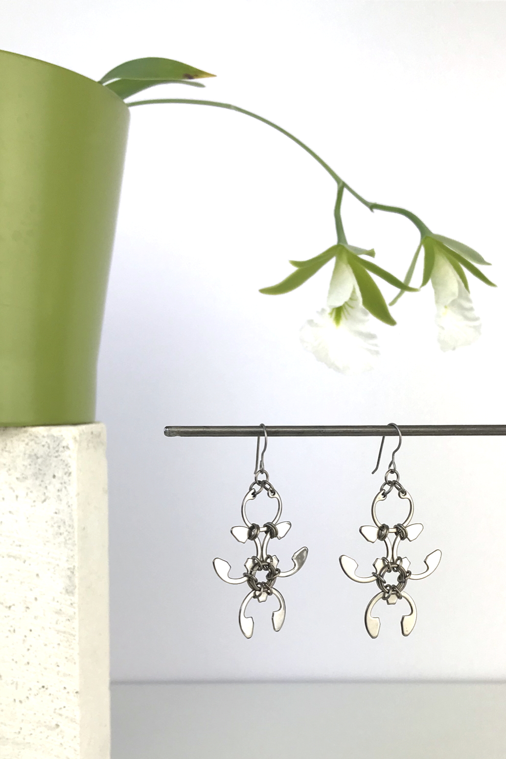 Wraptillion's Garland Earrings with blooming orchid Encyclia mariae.